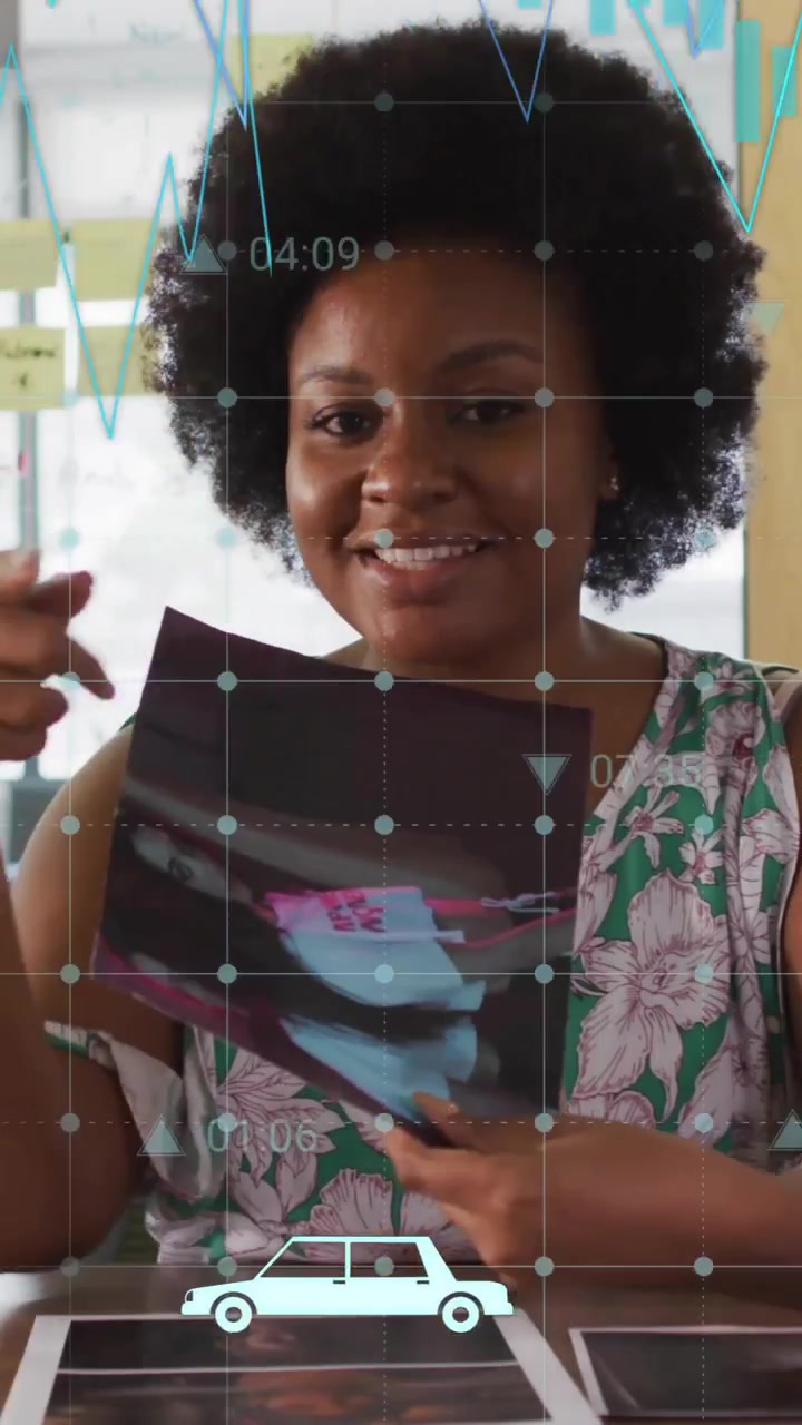 Animation of financial data processing over african american businesswoman in office