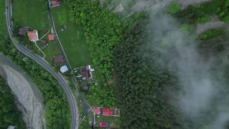 top view of mountain road and village in lepsa, vrancea county, romania