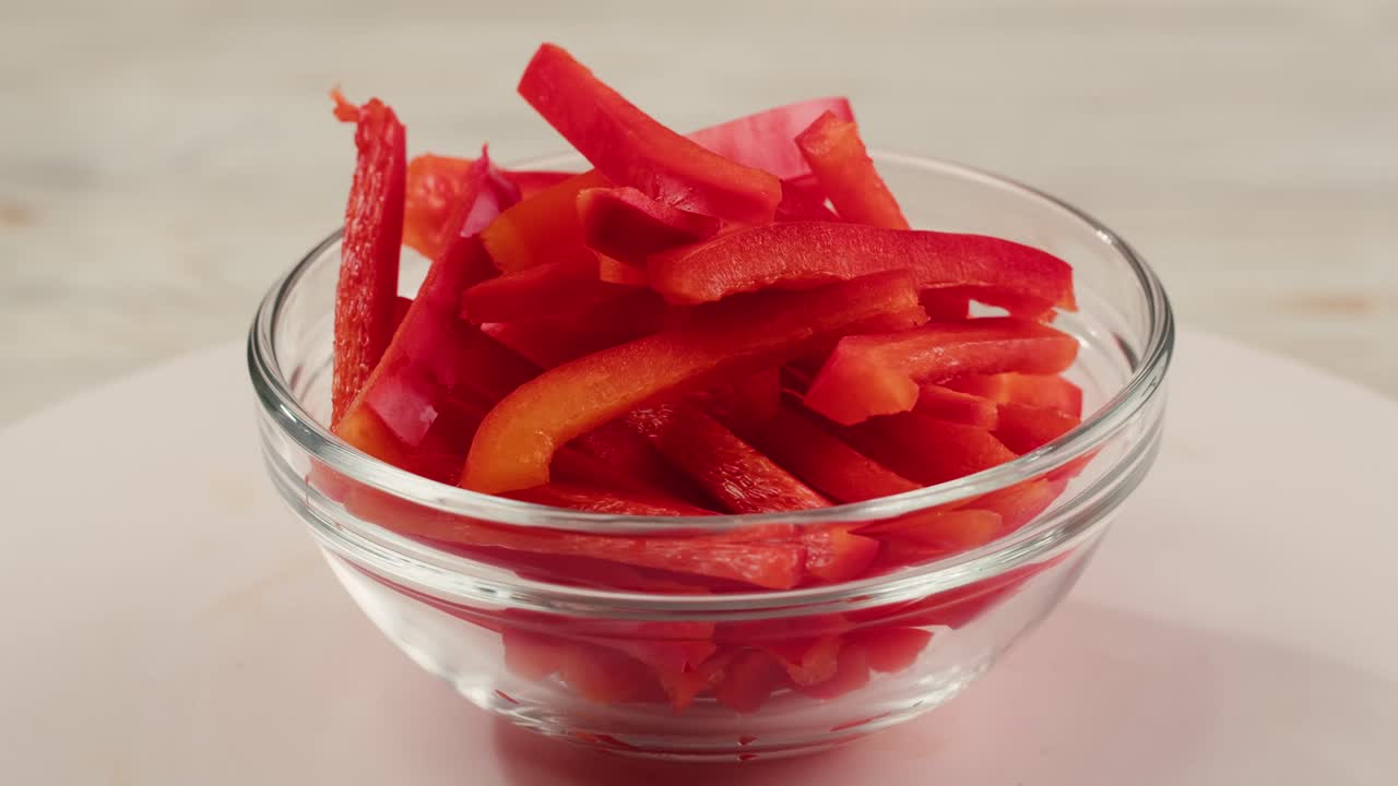 Red Bell Pepper Slices in a Bowl