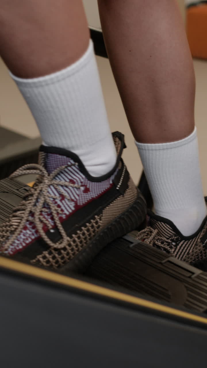 Person Exercising on Treadmill