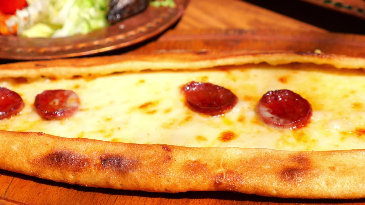Turkish Pide with Cheese and Sucuk
