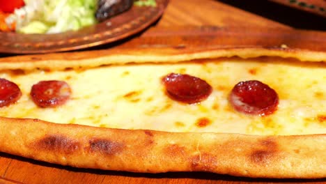 turkish pide with cheese and sucuk