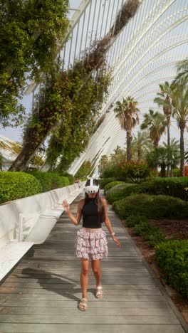 woman experiencing virtual reality in a modern park