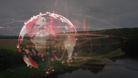 animation of glowing globe and network over rural landscape