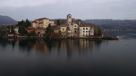 drone footage around the town of orta san giulio on orta lake