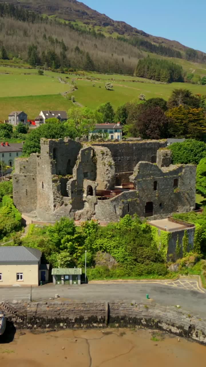 Pull-out social ratio aerial video of Carlingford Castle in County Louth, Ireland. Filmed in 1080x1920, 60FPS and with Rec709 color