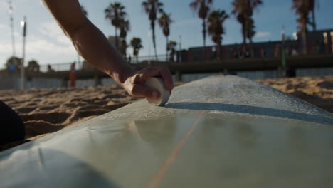 surfer man walking to the beach at sunset preparing for surfing training and search for waves in barcelona, spain, water, ocean exercise in sea with board, athletic male holiday or travel in vacation