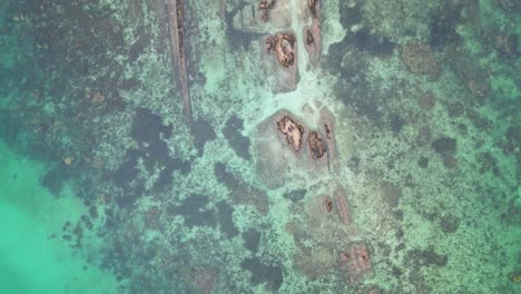 Top-down-aerial-perspective-of-Timbayan-rock-runway-formation-in-sulu-sea,-balabac