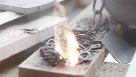 laser cleaning rusty chain on old wooden planks