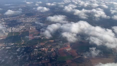 aerial view of israeli city and farmlands