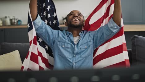 Front-view-video-of-extremely-happy-man-with-USA-flag.