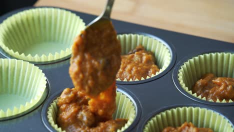 Adding-batter-to-pan-for-vegan-pumpkin-muffins-using-real-roasted-pumpkin-in-bowl-healthy-dairy-free-recipe-vegan