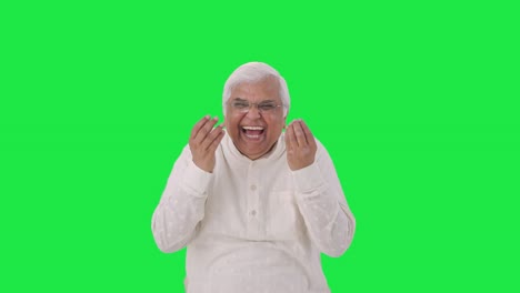 Happy-Indian-old-man-laughing-on-someone-Green-screen