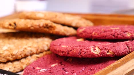 assortment of cookies in wooden tray