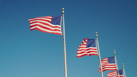 American-Flags-Against-Blue-Sky