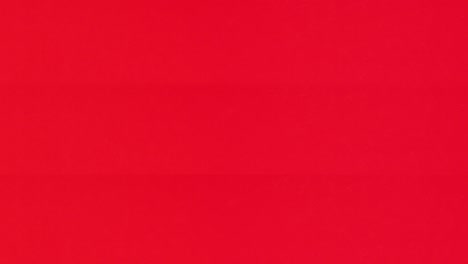 santa claus, copos de nieve y adornos navideños aparecen en filas en el tema rojo.