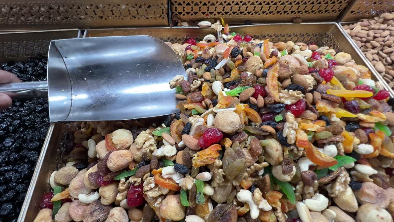 Various dried fruits from Afghanistan mixed and kept in display at an exhibition.