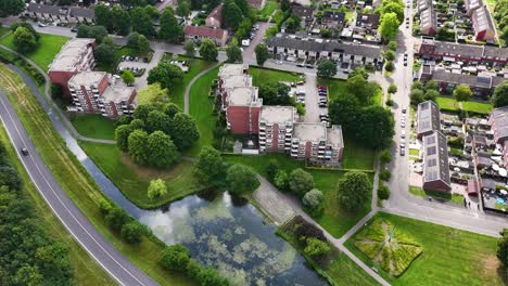 Aerial View of a European Residential Area with Canal and Parks