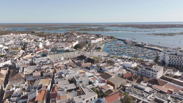 Smooth forward view over Faro heading toward the old town and harbor.