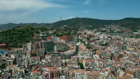 A-cinematic-slow-motion-aerial-drone-shots-of-the-Barcelona-community-with-the-Pyrenees-landscape-in-the-background