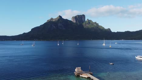 Volcanic-mountains-across-Pofai-Bay-on-south-Pacific-island,-Bora-Bora