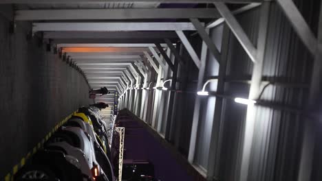 People-walking-in-a-lonely-corridor-at-night-during-a-pandemic