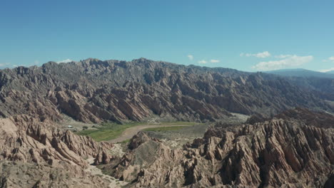 aerial - quebrada de las flechas ravine, argentina, wide forward shot