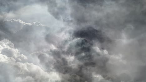 a thunderstorm that flashed inside the thick cumulus cloud and moved