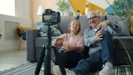 elderly couple doing a video call