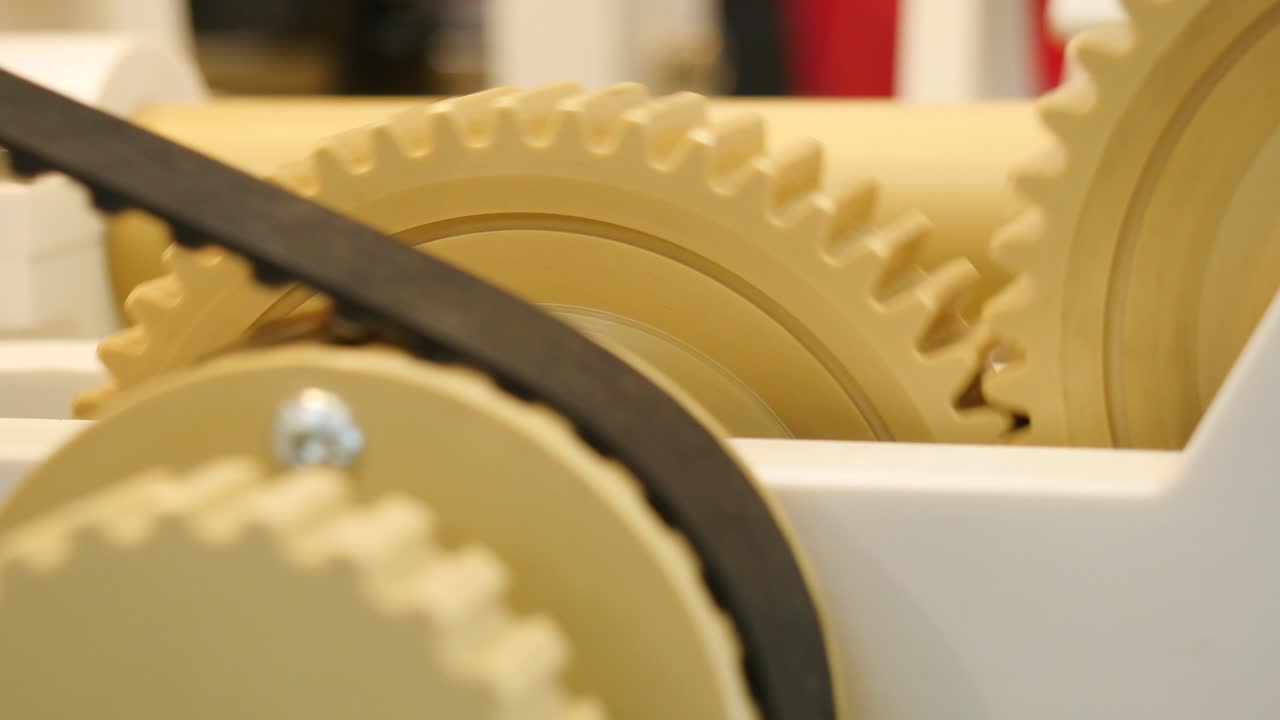 Close-up of gears and belt