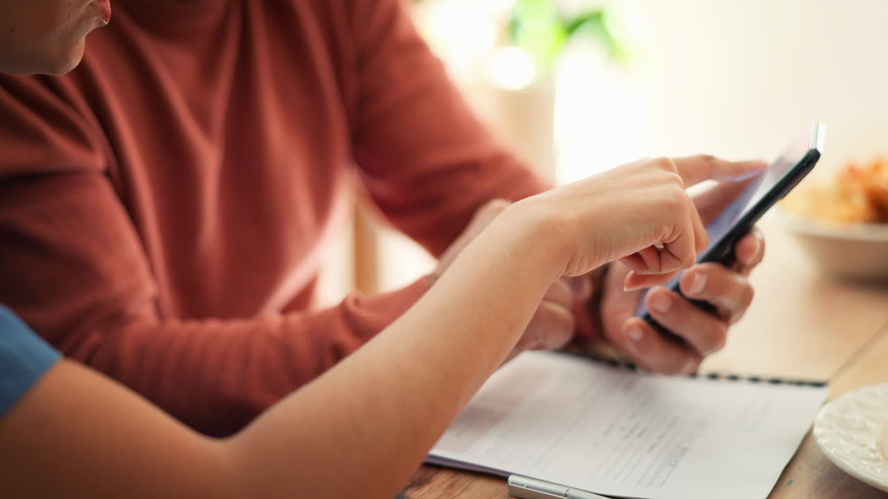 Documents, phone and people in home for insurance