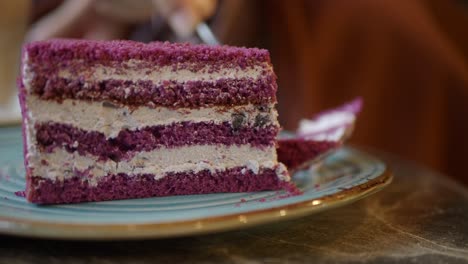 slice of purple cake on a plate