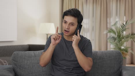 Angry-Indian-man-shouting-on-phone