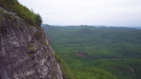 aerial reveal of whiteside mountain in north carolina