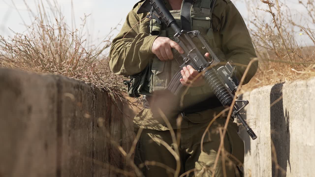 IDF military (Israel Defense Forces) tactical operation with assault rifles, Golan Heights, Gaza