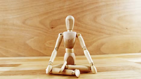 Figurine-performing-yoga