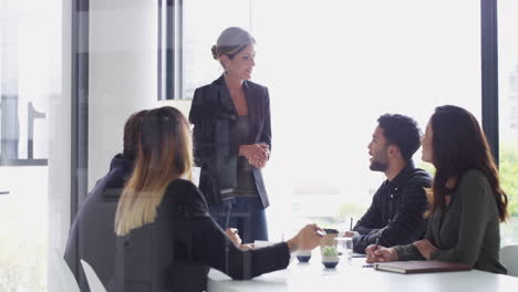 a-group-of-young-businesspeople-having-a-boardroom