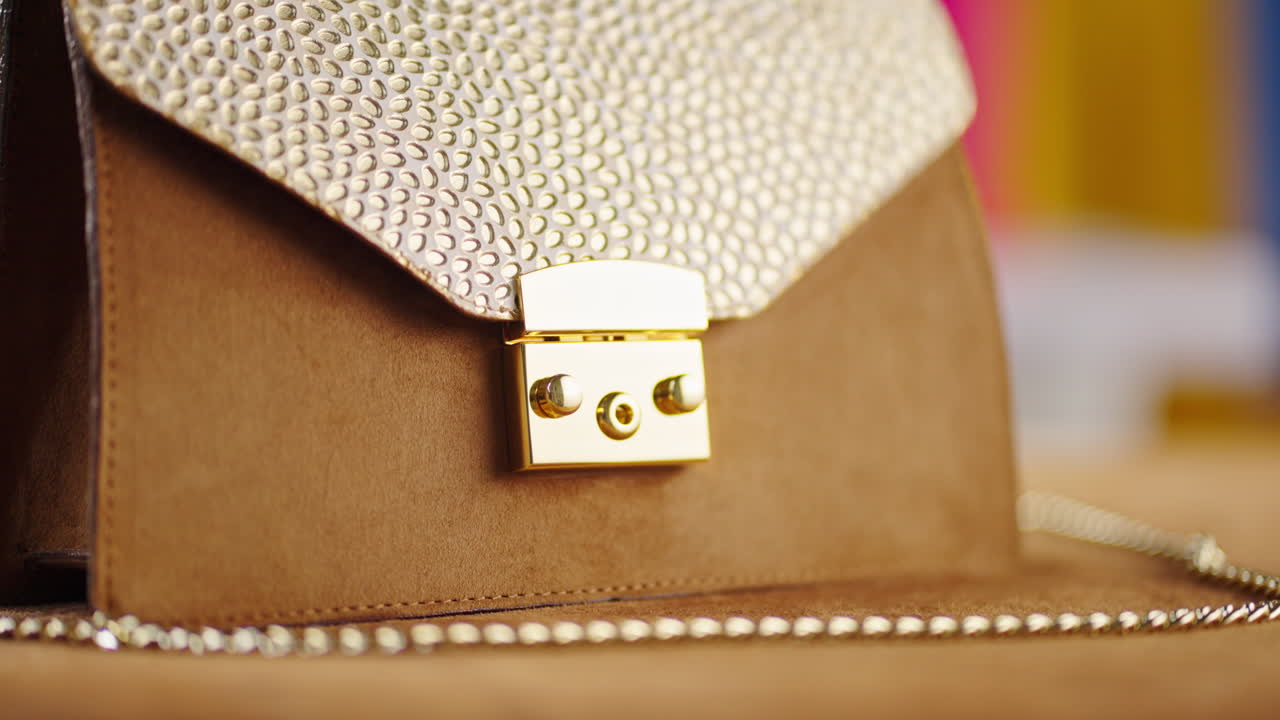 Elegant Gold and Brown Handbag