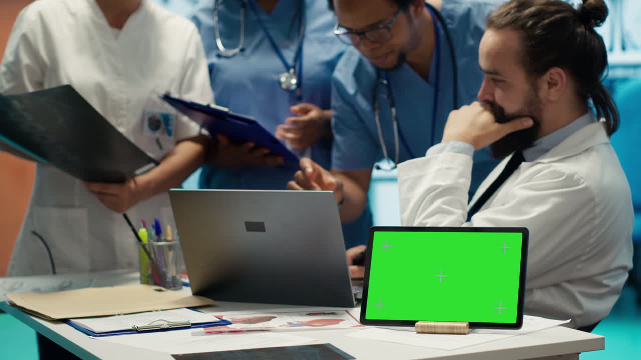 Medical Professionals with Green Screen Tablet