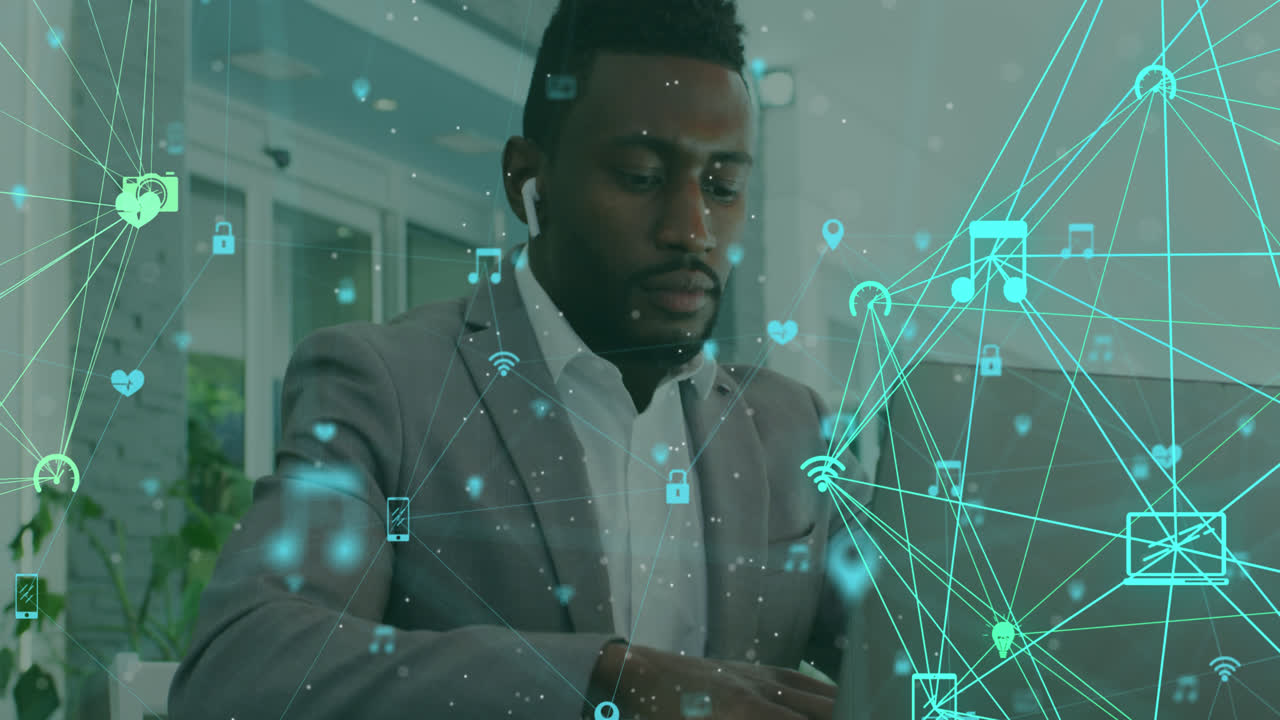 Globe of network of connections against african american man using laptop