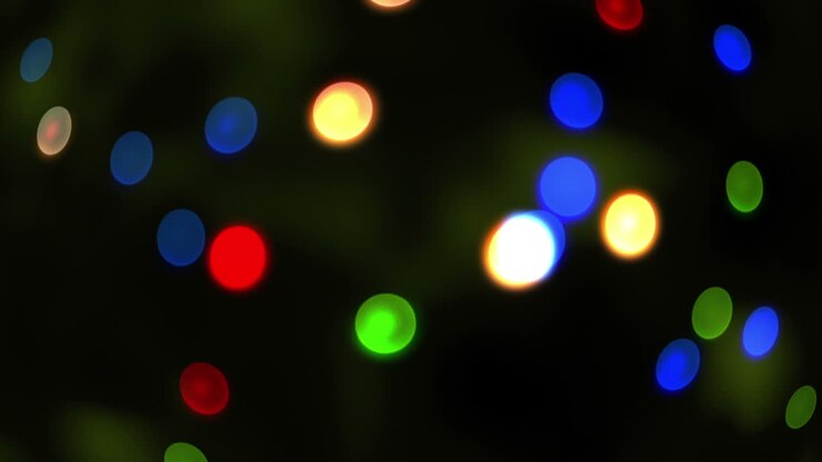 Cerchi luminosi di luce in movimento su sfondo nero