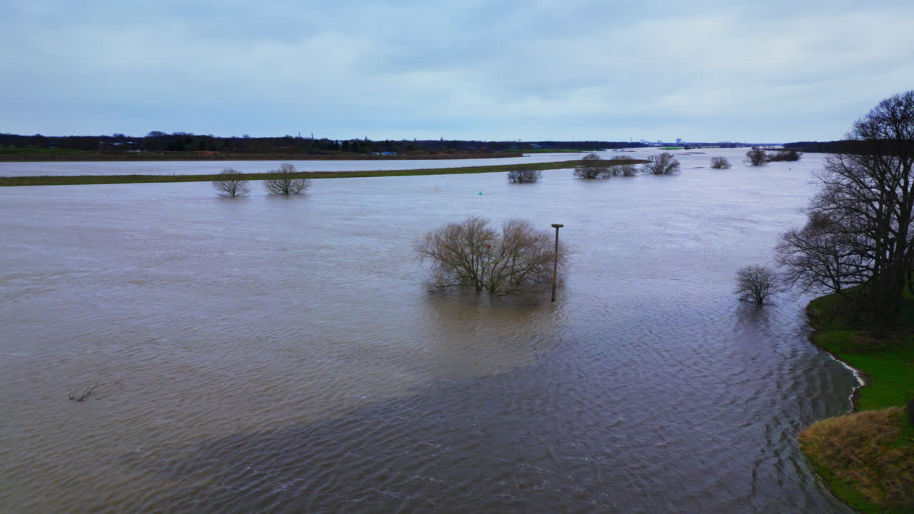 High water level in river Meuse Dutch winter Limburg landscape shot