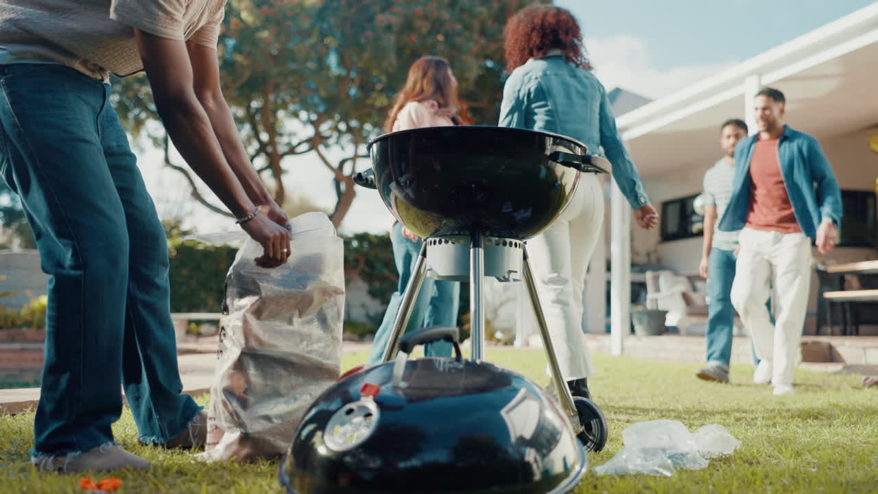 People enjoying a barbecue in the backyard