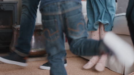 happy-family-dancing-at-home-having-fun-dance-celebrating-together-little-children-celebrate-with-mother-and-father-enjoying-exciting-weekend-4k-footage