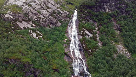 steall waterfall drone shot on a cloudy moody day