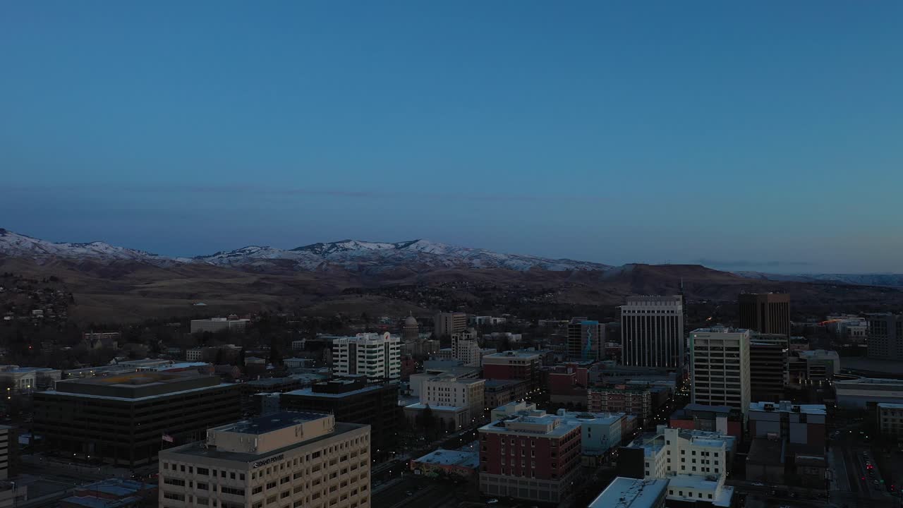 Aerial shot soaring over Boise, Idaho before sunrise