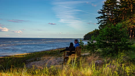 time lapse of romantic couple accentuating their intimate connection and shared moments of togetherness by the sea