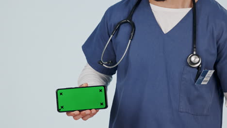 Thumbs-up,-doctor-and-green-screen-of-phone