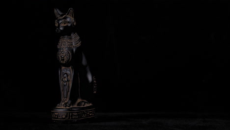 Dolly-of-a-small-replica-Egyptian-Statue-of-Bastet---Wide-Left-to-Right