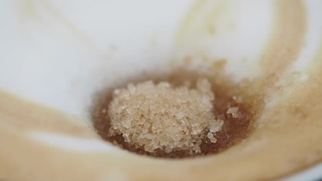 closeup of latte with sugar